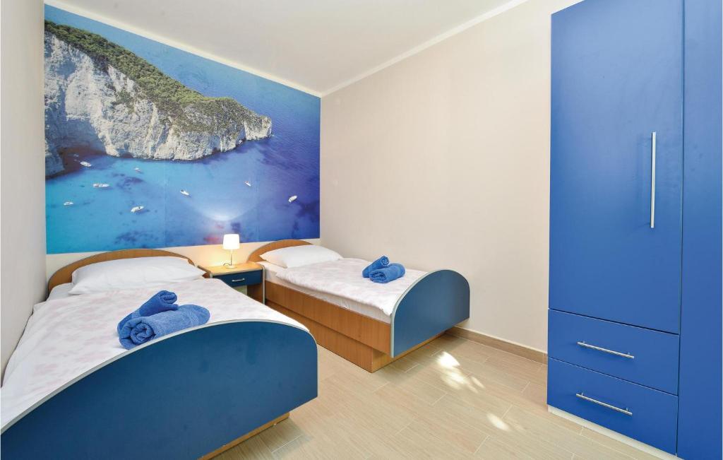 Postel nebo postele na pokoji v ubytování Holiday Home Murter 44 With Outdoor Swimmingpool