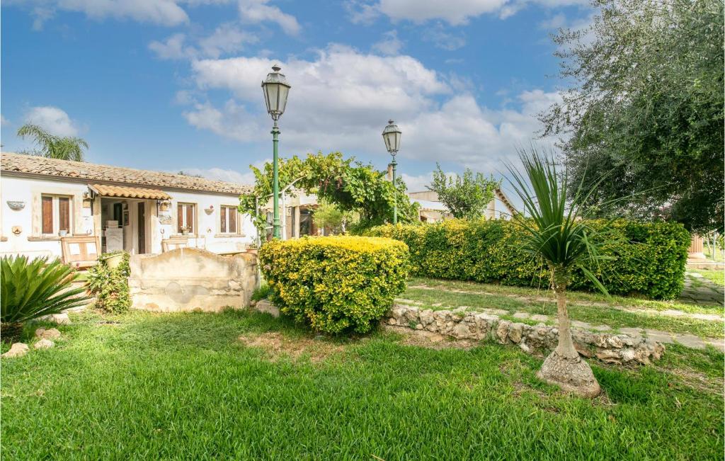 A garden outside 4 Bedroom Stunning Home In Arenella