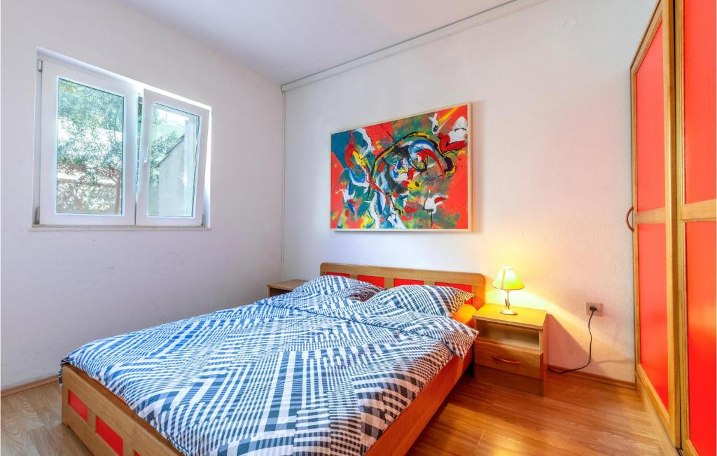 Posteľ alebo postele v izbe v ubytovaní Apartment Kamelicina I