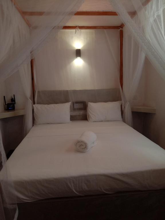 Postel nebo postele na pokoji v ubytování Chameera guest house