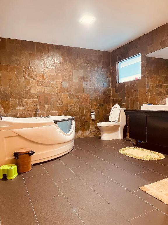 Koupelna v ubytování Pelita Commercial Centre Homestay 百丽达商圈民宿 9pax