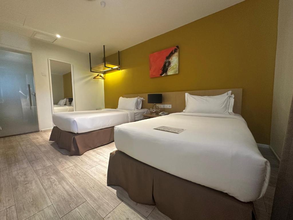 Postel nebo postele na pokoji v ubytování SGI Vacation Club Hotel