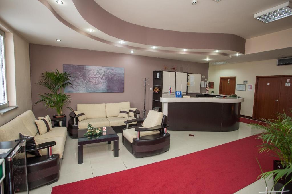 Χώρος καθιστικού στο Sin-Kom Hotel Garni
