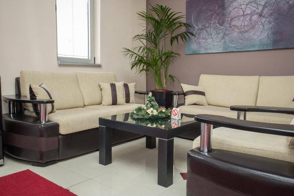 Χώρος καθιστικού στο Sin-Kom Hotel Garni