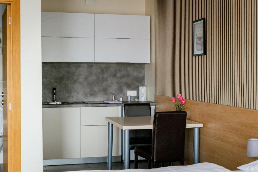 Kuchyň nebo kuchyňský kout v ubytování Nava Motel SELF CHECK-IN