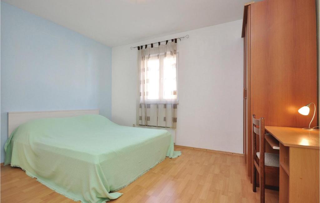 Postel nebo postele na pokoji v ubytování Apartment Pucisca 46