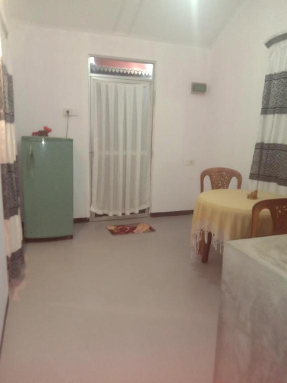 Postel nebo postele na pokoji v ubytování Chameera guest house
