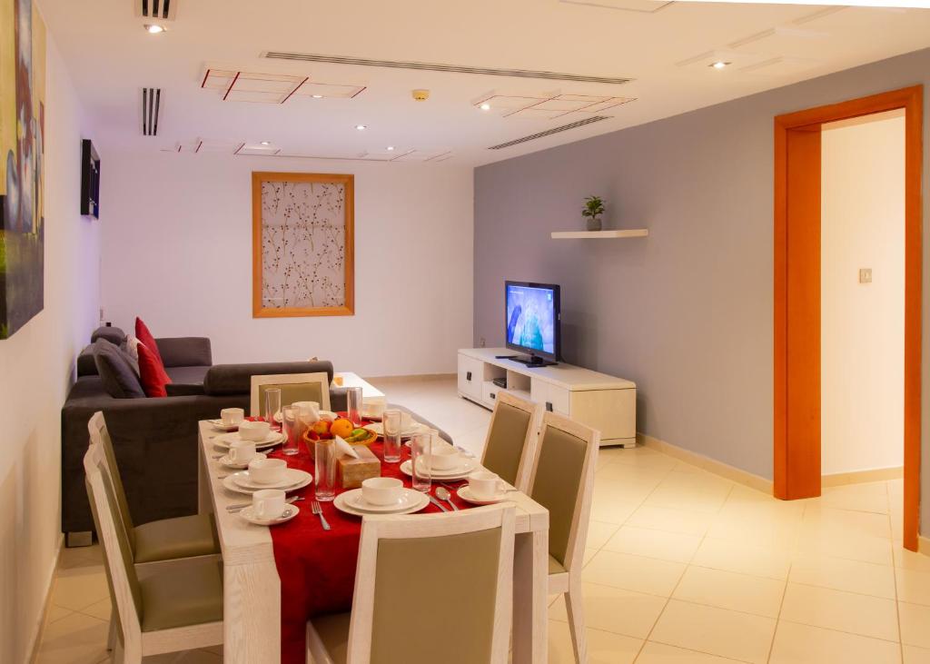 A television and/or entertainment centre at Al Liwan Residence
