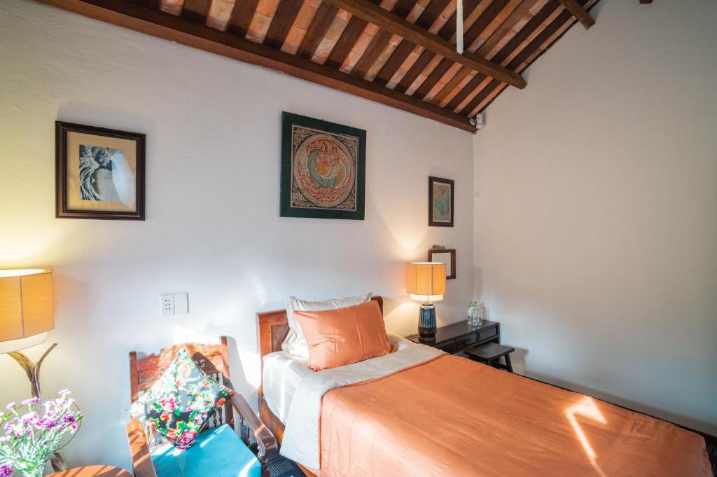 Postel nebo postele na pokoji v ubytování Aloha Hoi An Homestay