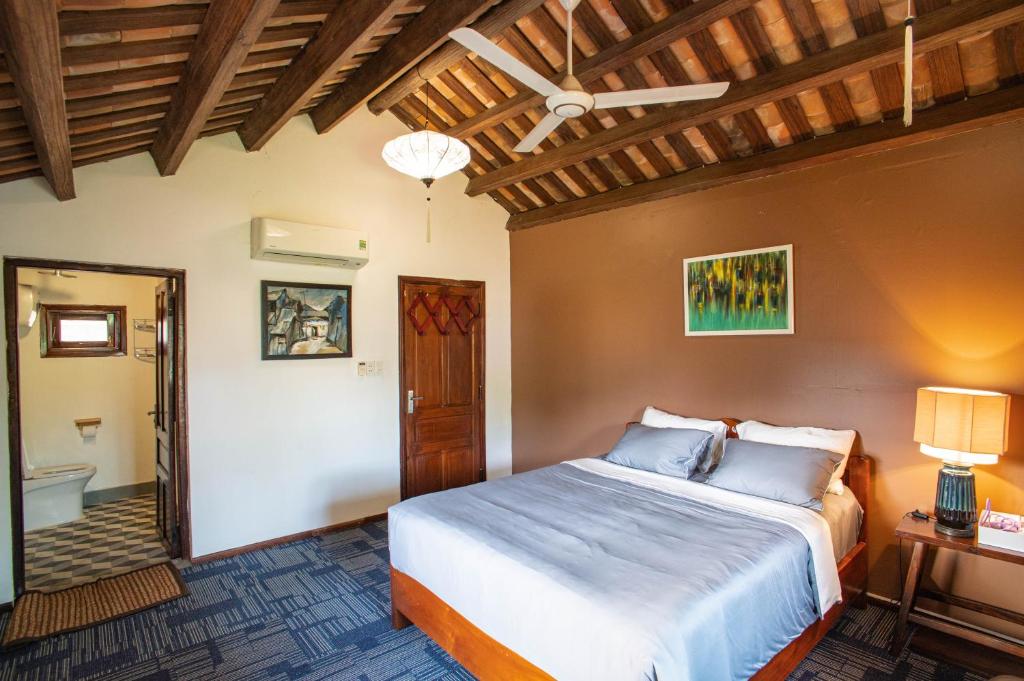 Postel nebo postele na pokoji v ubytování Aloha Hoi An Homestay