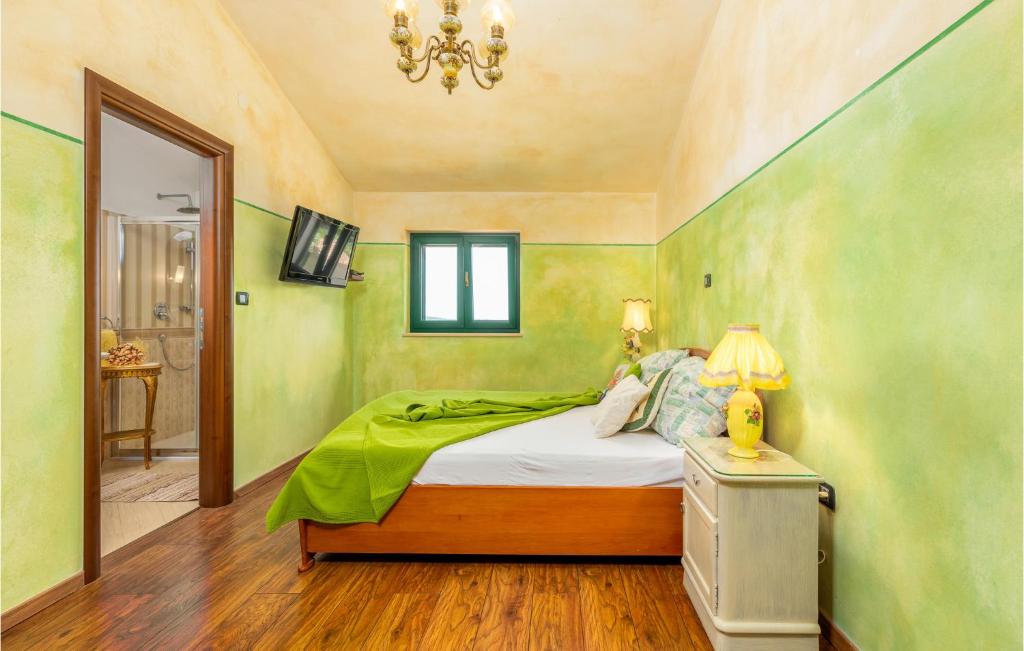 Posteľ alebo postele v izbe v ubytovaní Holiday Home Valtura Valtura