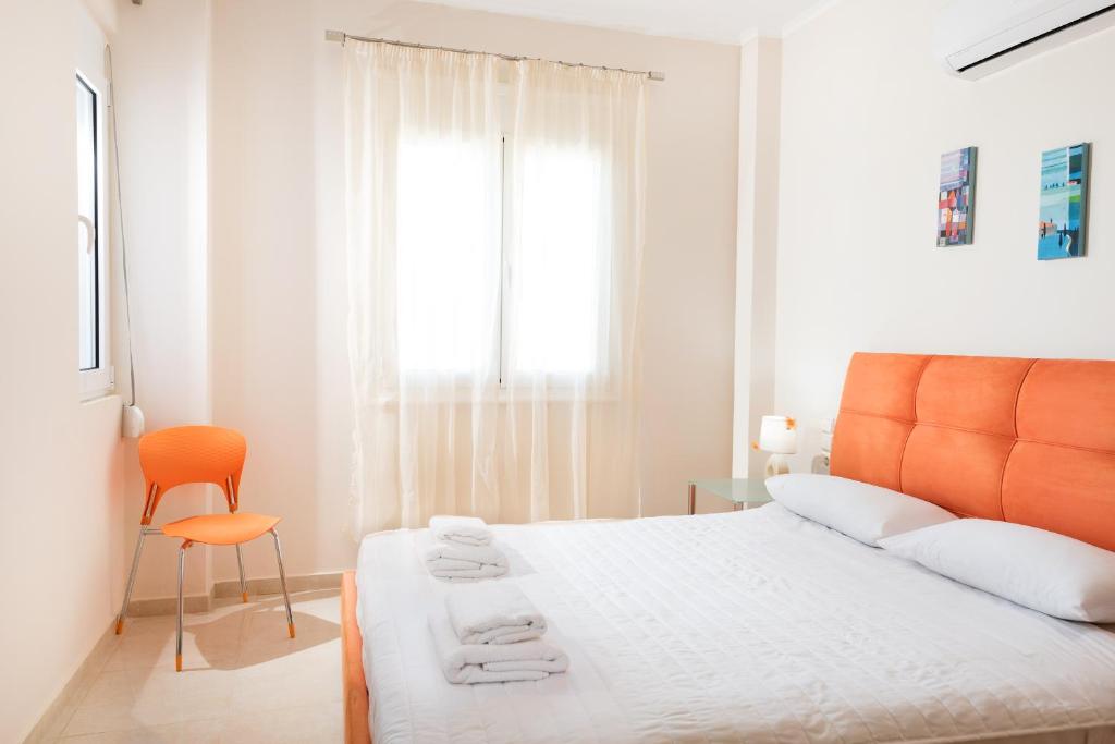 Posteľ alebo postele v izbe v ubytovaní Kronos Villas