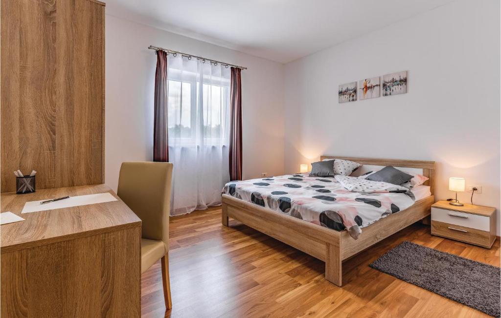 Postel nebo postele na pokoji v ubytování Four-Bedroom Holiday Home In Pazin