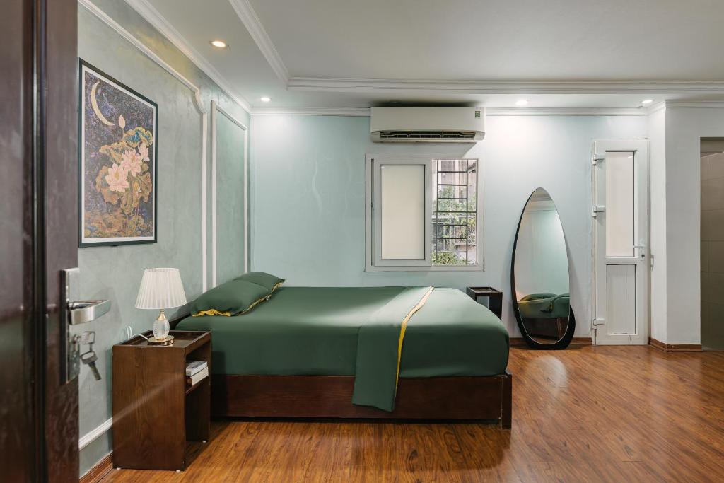 Postel nebo postele na pokoji v ubytování Legume House - 50m to Hoan Kiem lake