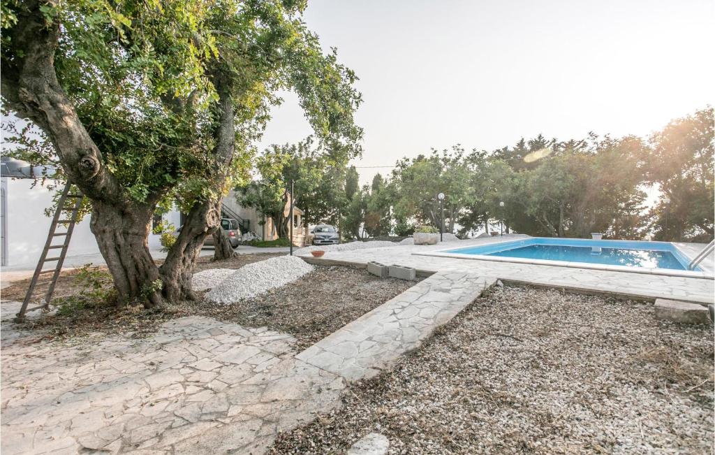 The swimming pool at or close to Nice Home In Modica With Wifi