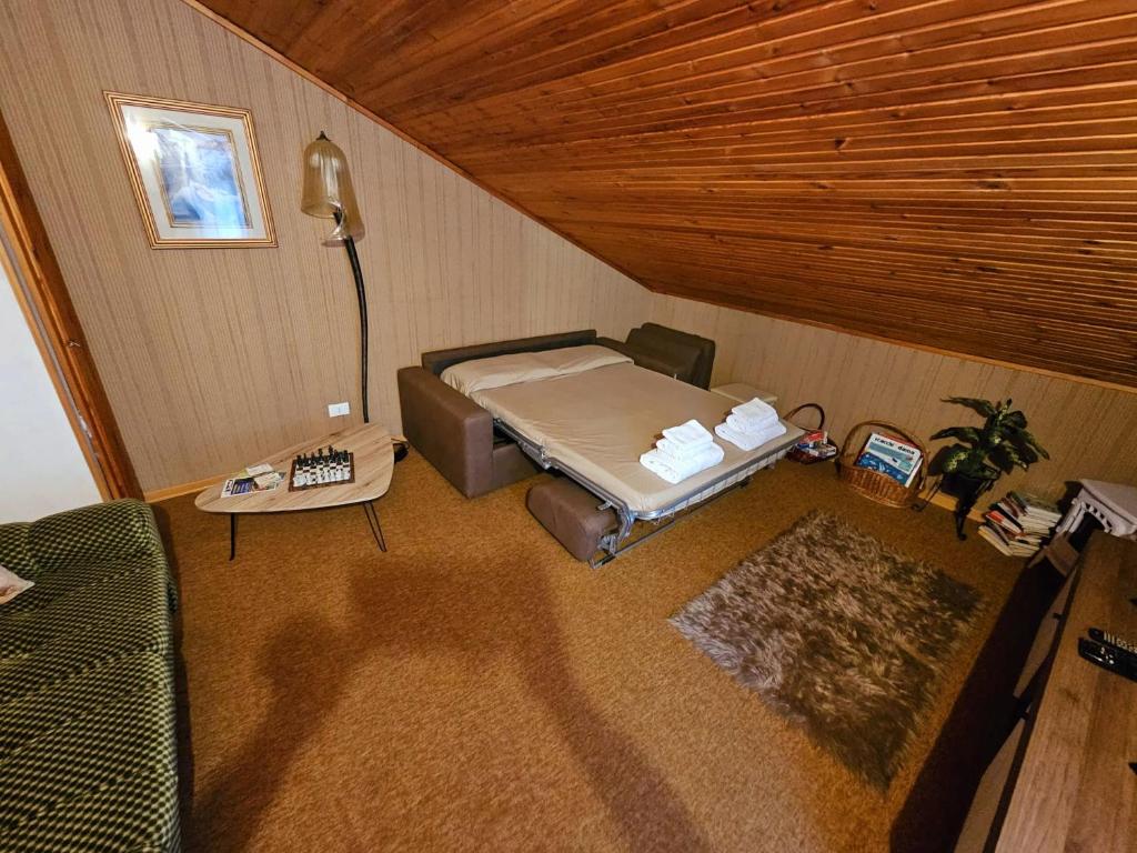 Postel nebo postele na pokoji v ubytování LORICAskiHOME