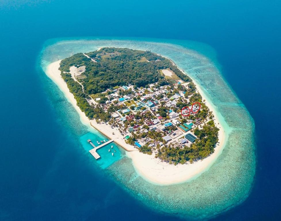 an island with a resort in the middle of the ocean at PRIV Fodhdhoo in Fodhdhoo