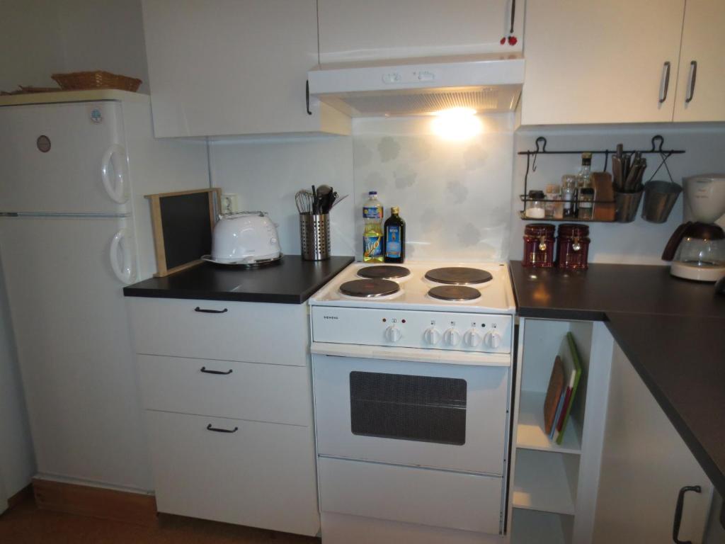 Kuchyň nebo kuchyňský kout v ubytování Teigur Guesthouse
