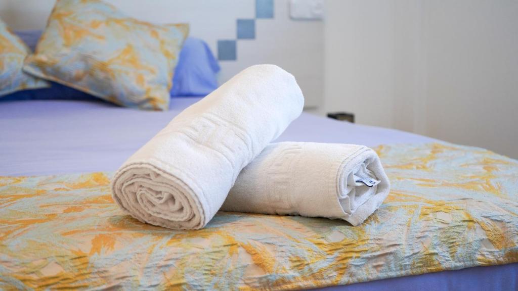 A bed or beds in a room at APARTAMENT LO COR DEL DELTA