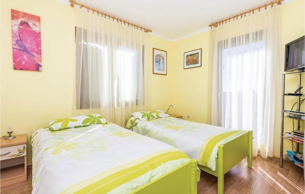 Posteľ alebo postele v izbe v ubytovaní 3 Bedroom Stunning Home In Kastav