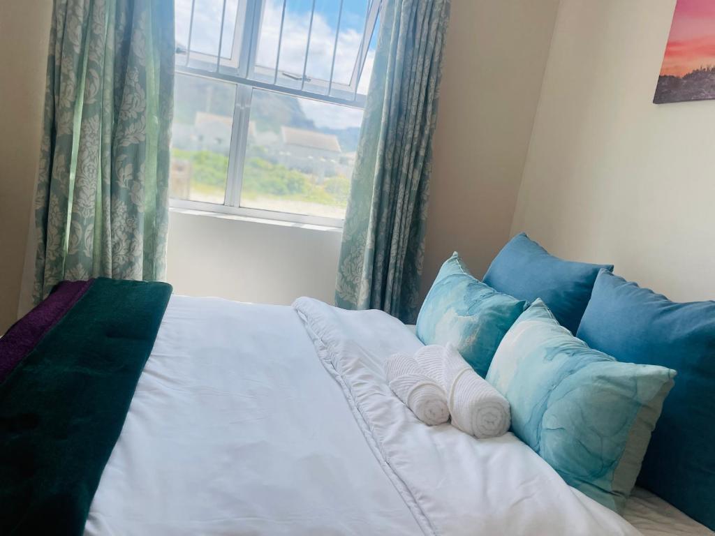 Ένα ή περισσότερα κρεβάτια σε δωμάτιο στο Dune crest