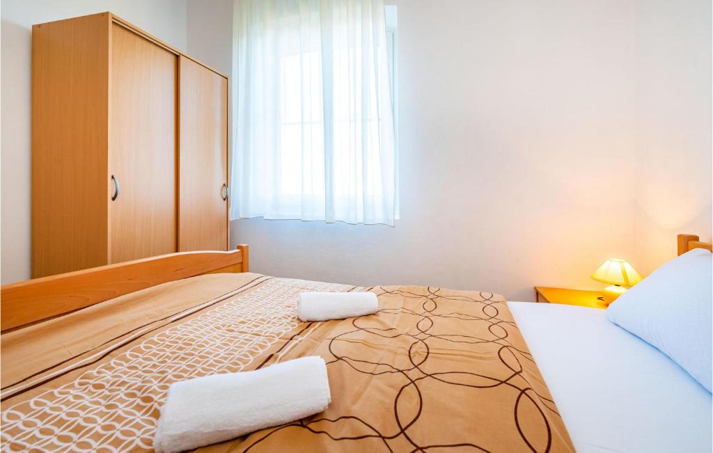 Postel nebo postele na pokoji v ubytování 2 Bedroom Amazing Apartment In Nevidane