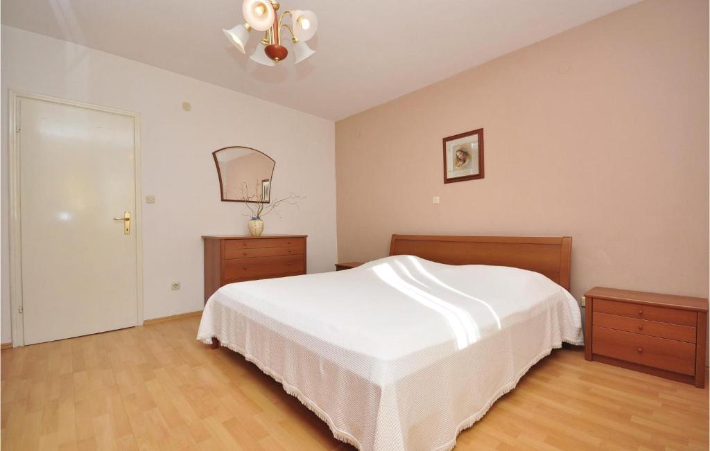 Postel nebo postele na pokoji v ubytování Apartment Pucisca 46