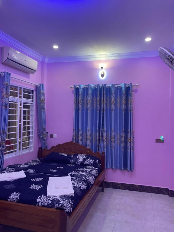 Postel nebo postele na pokoji v ubytování Bun Homestay