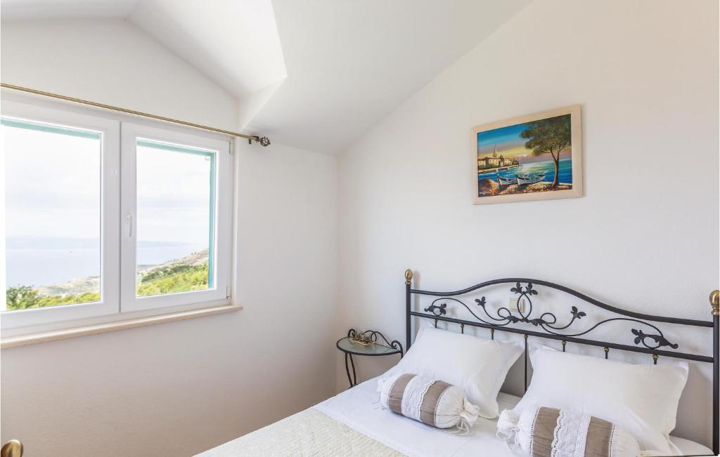Posteľ alebo postele v izbe v ubytovaní 4 Bedroom Stunning Home In Tucepi
