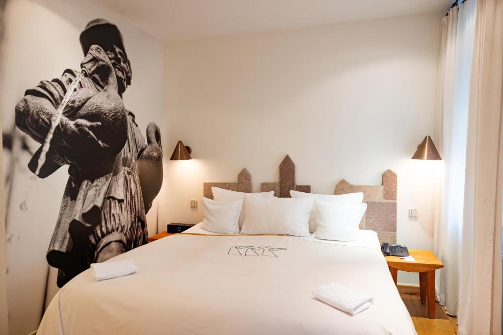 Postel nebo postele na pokoji v ubytování Hotel Drei Raben