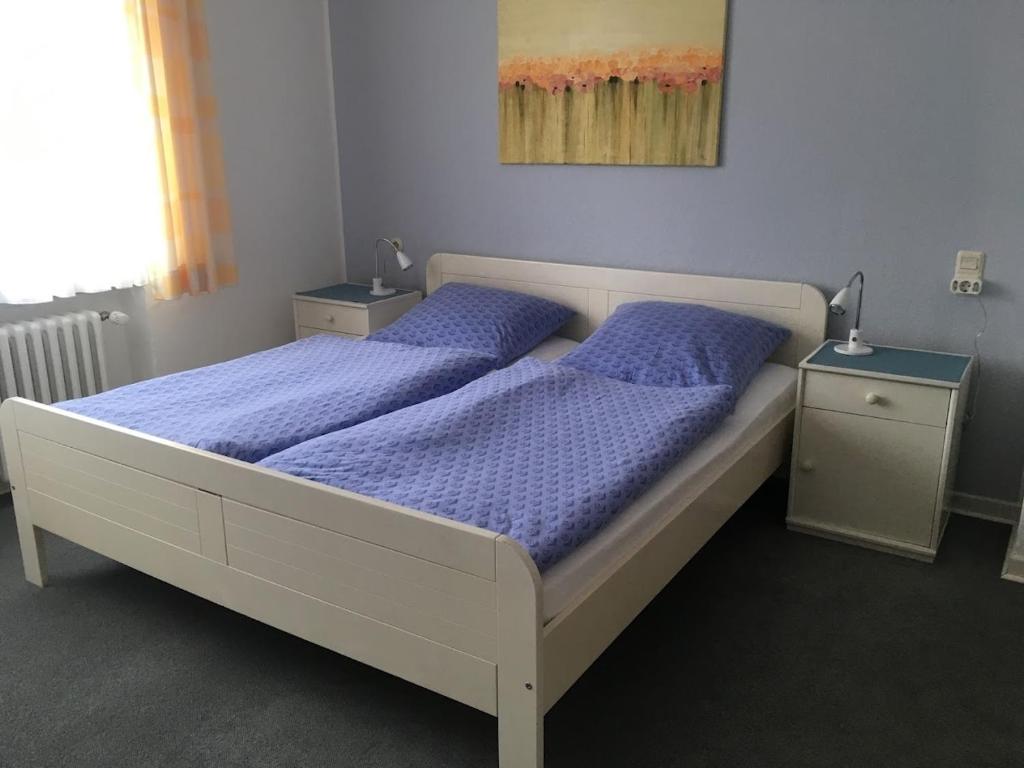 Postel nebo postele na pokoji v ubytování Hotel Wolbeck