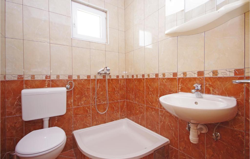 Kúpeľňa v ubytovaní Holiday Apartment Makarska 3