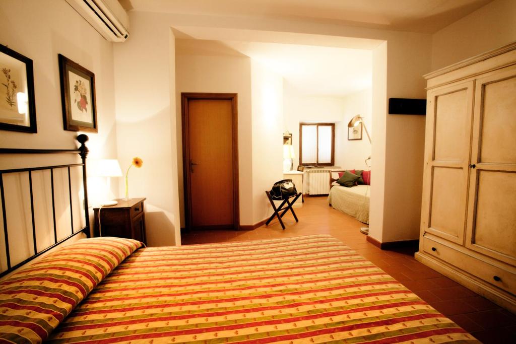 Postel nebo postele na pokoji v ubytování Antico Casale Di Scansano Resort