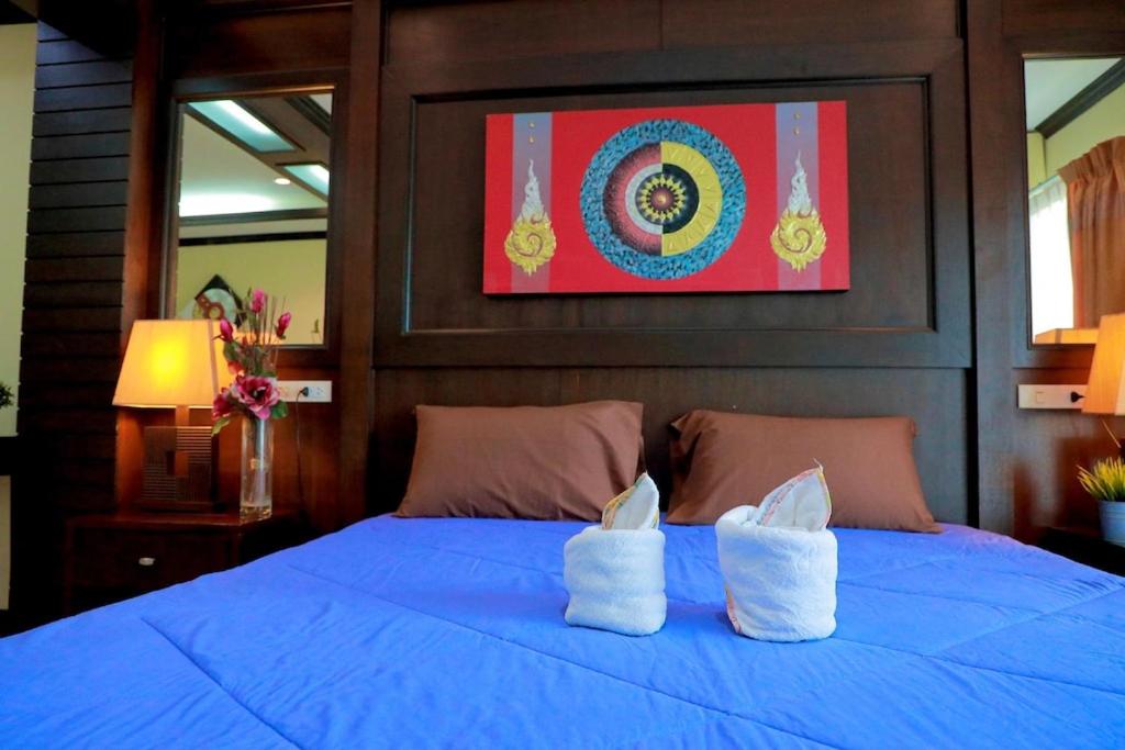 Postel nebo postele na pokoji v ubytování Swiss Style Guesthouse