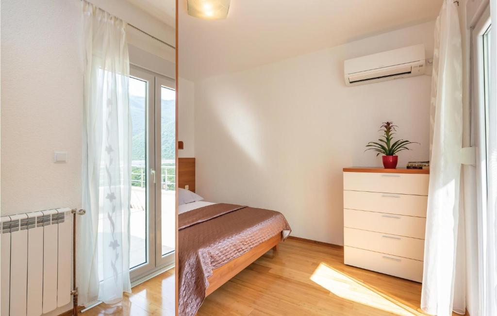Posteľ alebo postele v izbe v ubytovaní 3 Bedroom Awesome Home In Zagvozd