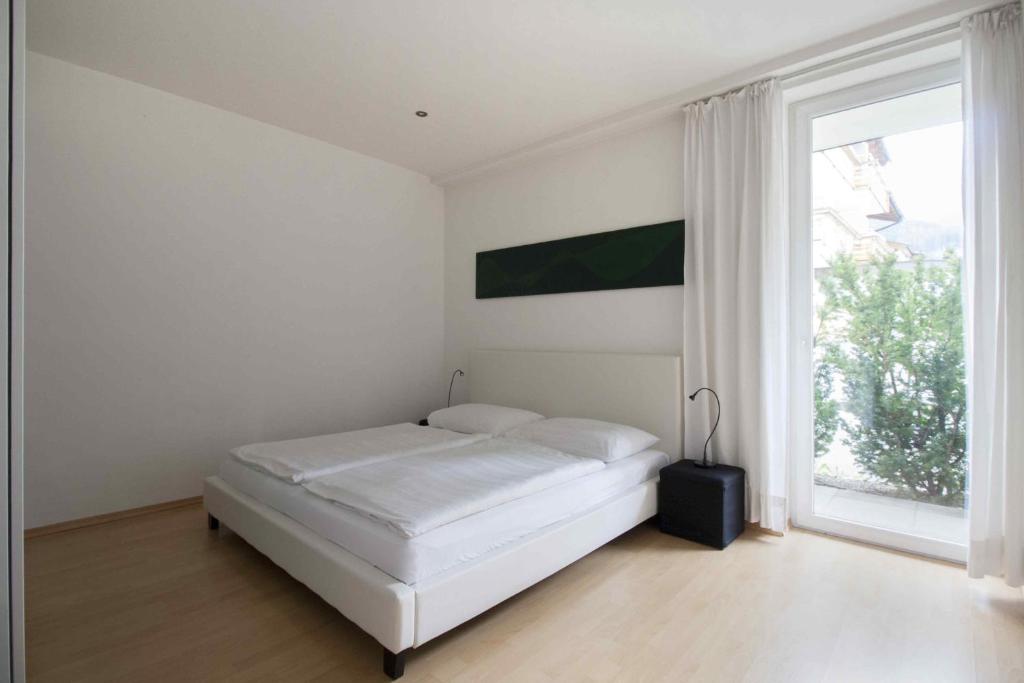 A bed or beds in a room at Appartements Christophorus