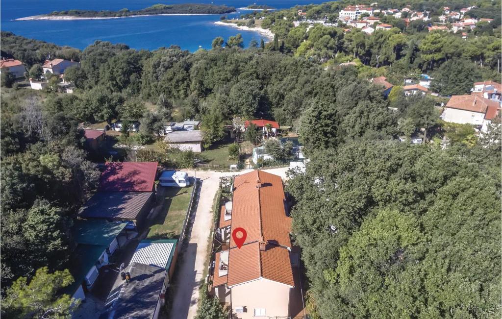 an aerial view of a house with a lake at Lovely Apartment In Banjole With Wifi in Banjole