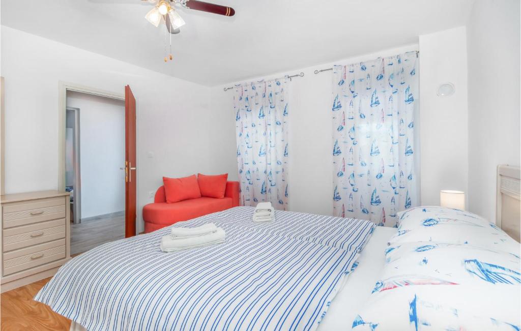 Postel nebo postele na pokoji v ubytování 3 Bedroom Lovely Home In Bribir