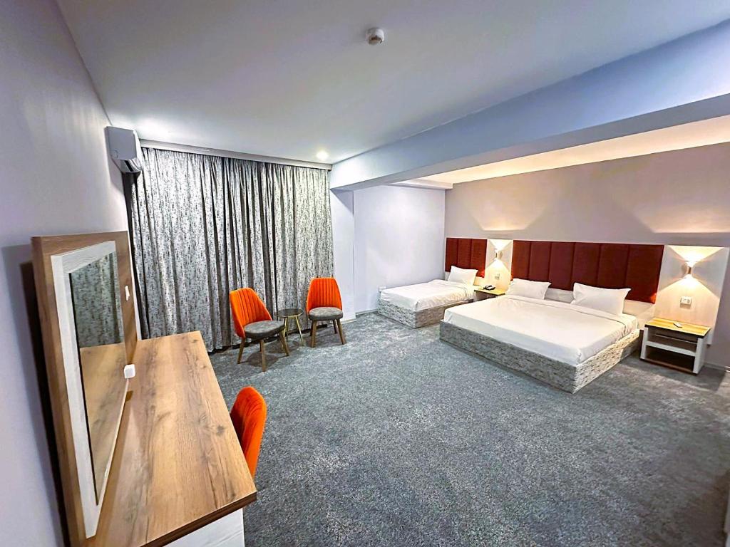 Postel nebo postele na pokoji v ubytování Amazon Hotel - Free Massage