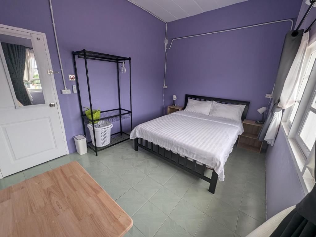 Postel nebo postele na pokoji v ubytování House Of Jade