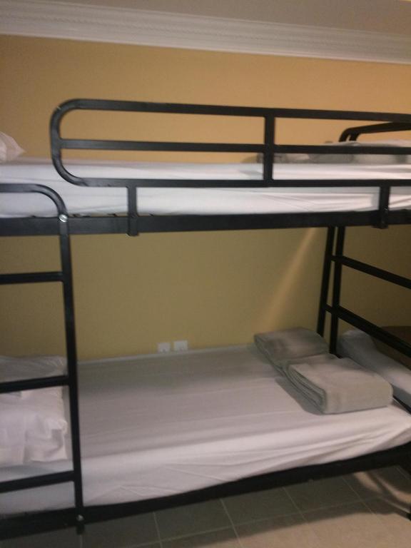 Postel nebo postele na pokoji v ubytování DC International Hostel 2