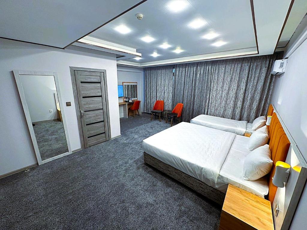 Postel nebo postele na pokoji v ubytování Amazon Hotel - Free Massage