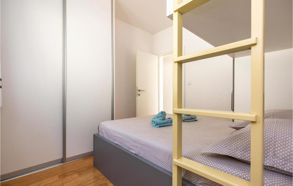Posteľ alebo postele v izbe v ubytovaní 3 Bedroom Awesome Home In Zagvozd