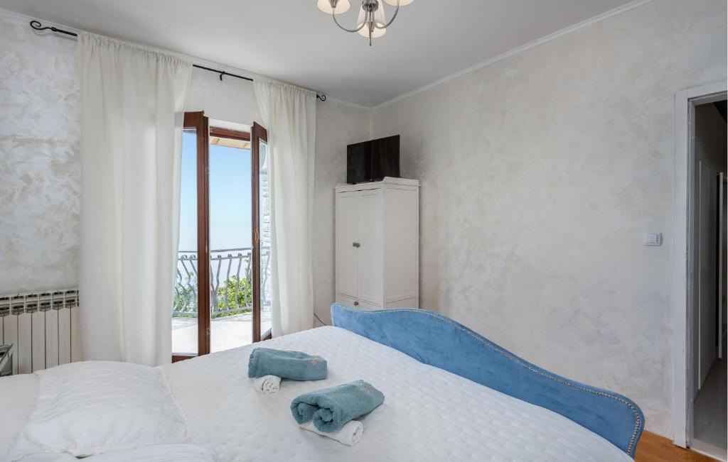 Posteľ alebo postele v izbe v ubytovaní Gorgeous Apartment In Matulji With Wifi