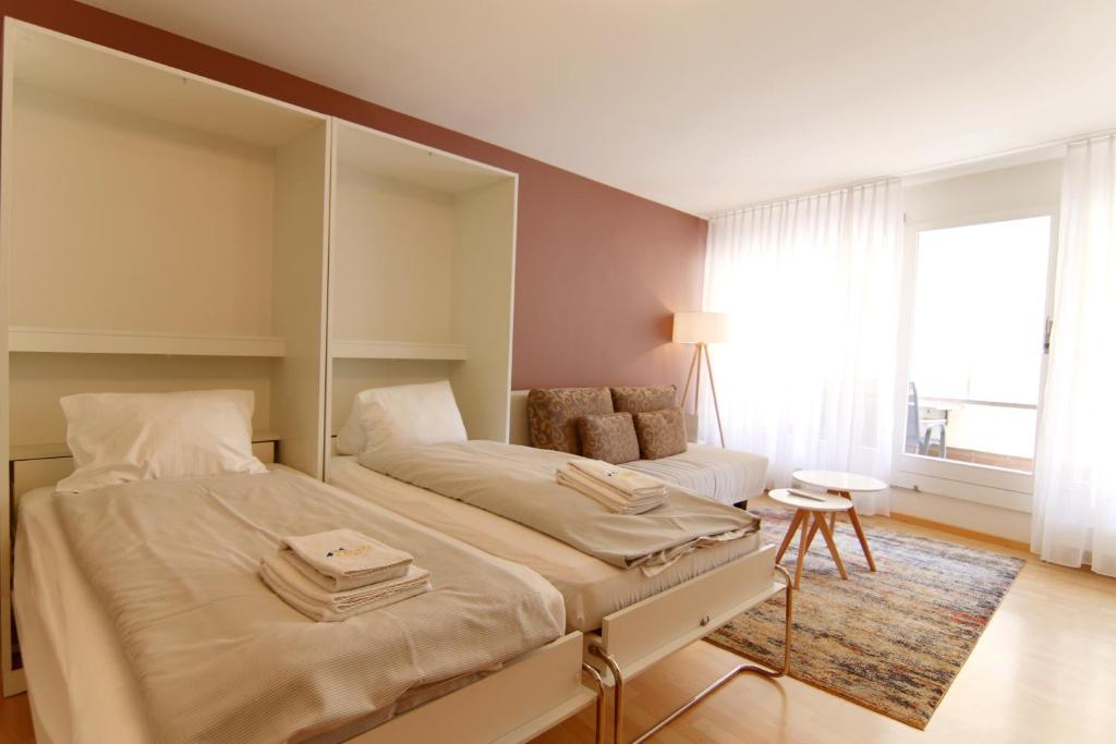 Postel nebo postele na pokoji v ubytování Lorez 5A by Arosa Holiday