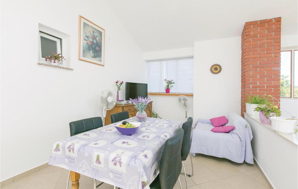 Telewizja i/lub zestaw kina domowego w obiekcie Apartment Labin Kapelica Iii