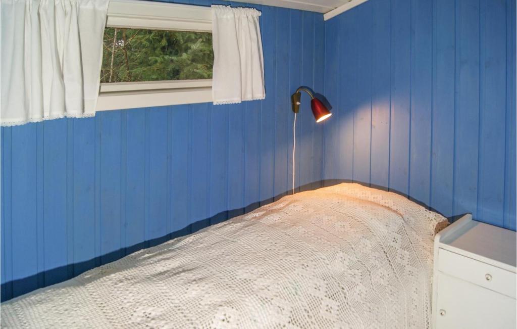 Postel nebo postele na pokoji v ubytování Two-Bedroom Holiday Home Nærbø With A Fireplace 04