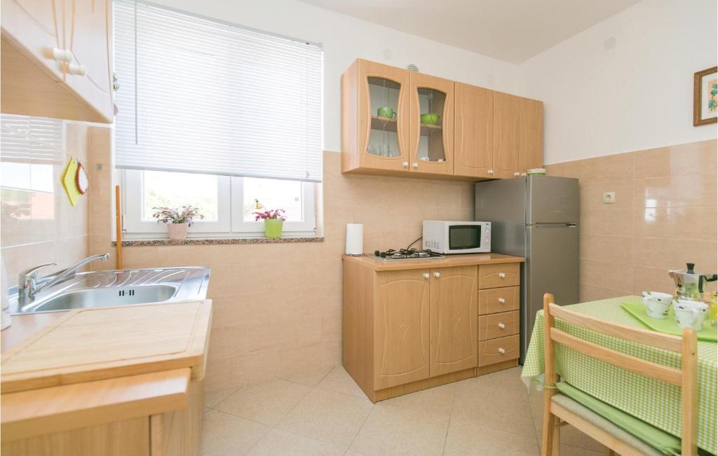 Kuchnia lub aneks kuchenny w obiekcie Apartment Labin Kapelica Iii