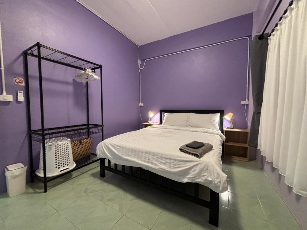 Postel nebo postele na pokoji v ubytování House Of Jade