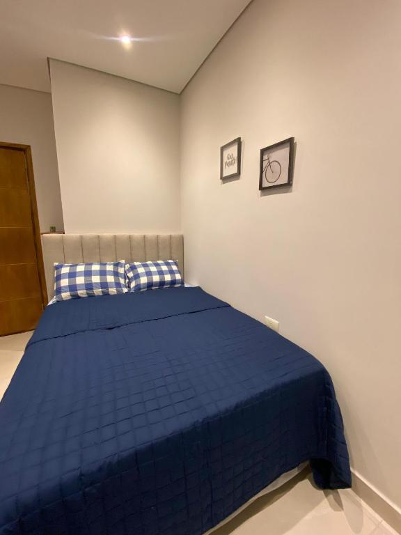 Voodi või voodid majutusasutuse Habitaciones con Baño toas